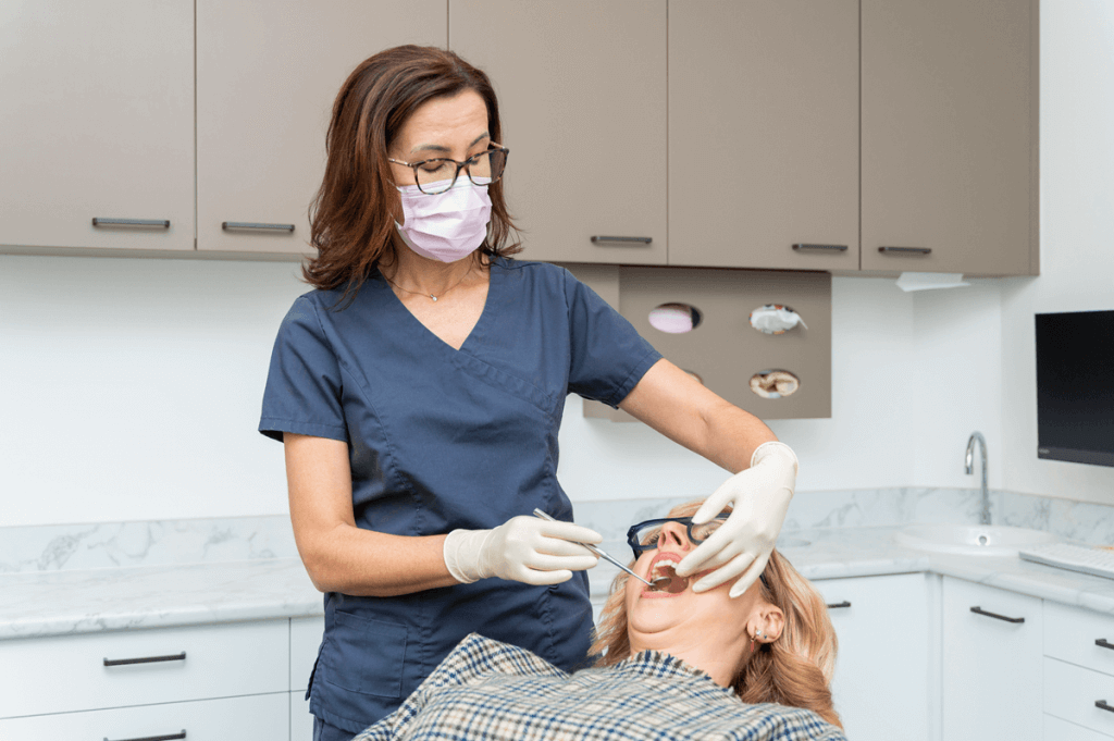 Hampton Beach Dentists performing a dental check-up and clean