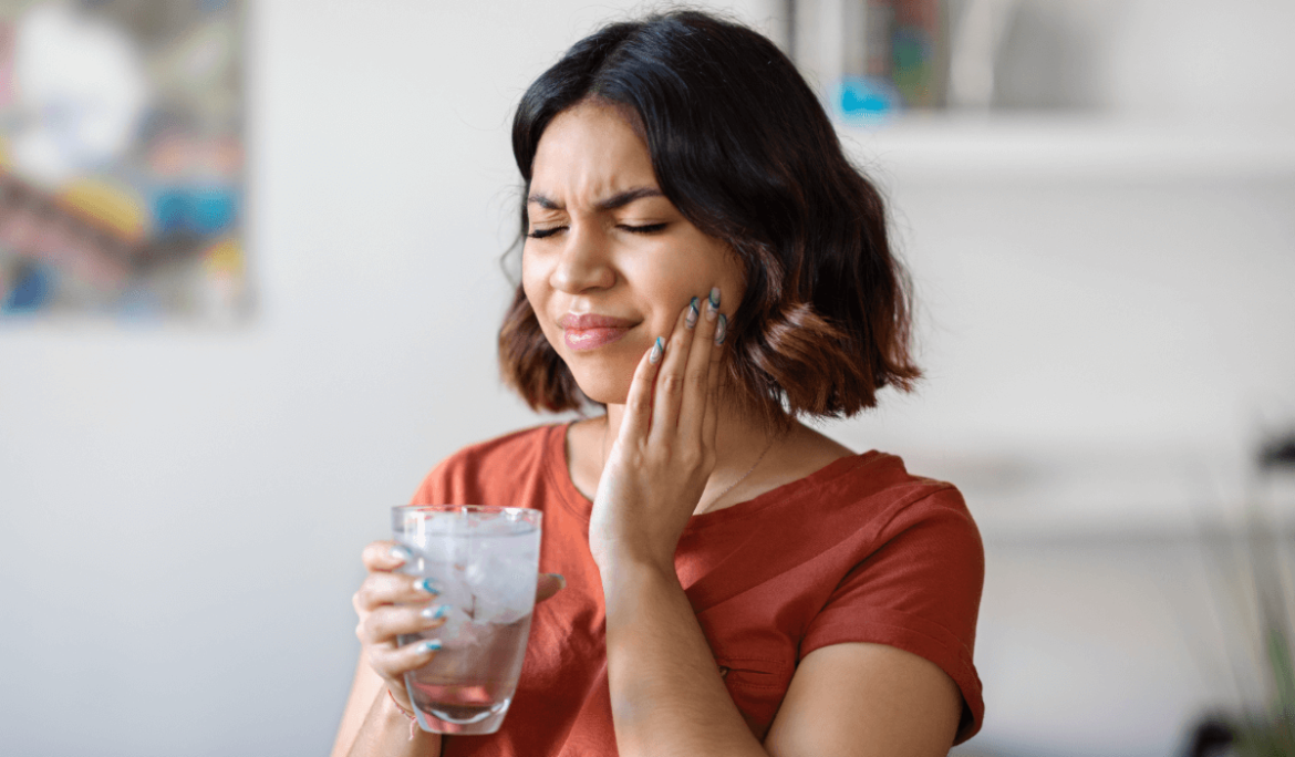 Woman with sensitive teeth