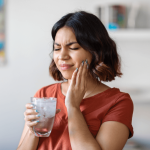 Woman with sensitive teeth