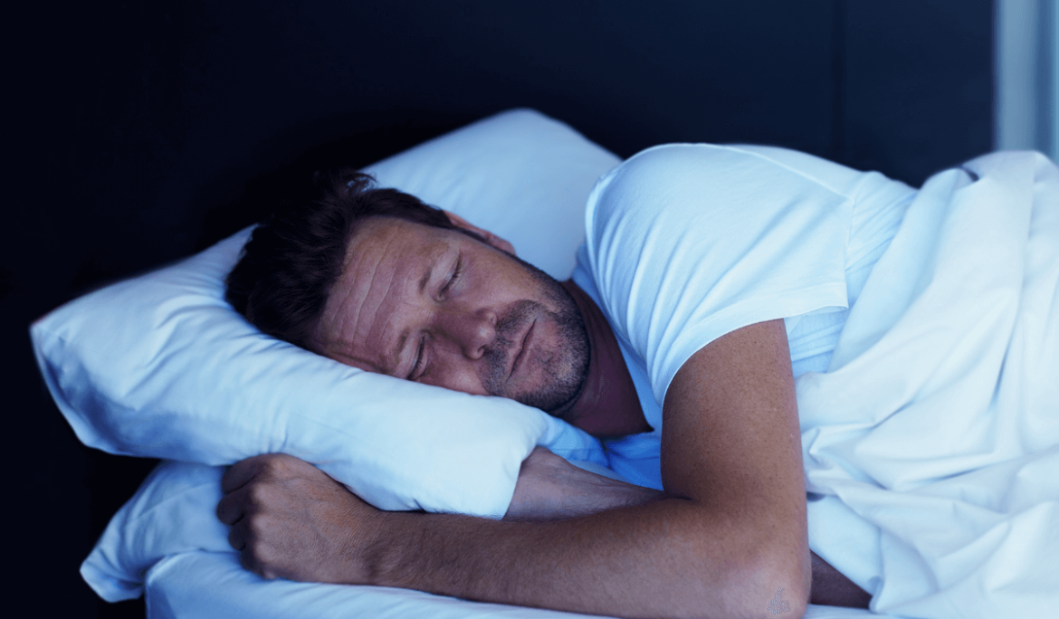 Man grinding his teeth in his sleep